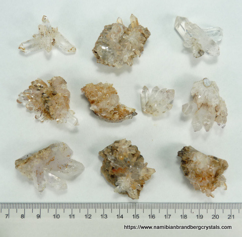 Ten small, lovely Brandberg quartz groups and clusters