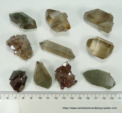 10 quartz crystal specimens, some double terminated and inclusions