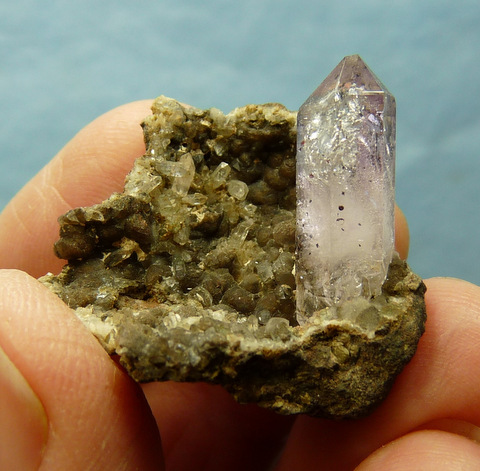 Quartz crystal in calcite and quartz geode