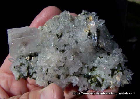 Quartz and gemmy, dark green epidote crystals on matrix