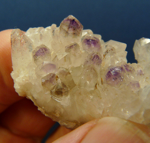 Quartz crystal group with amethyst phantoms