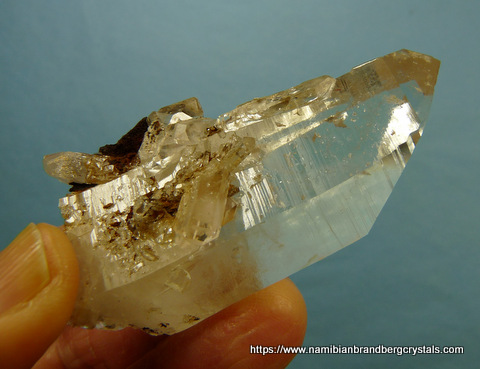 Beautiful quartz crystal with miniature crystals and goethite