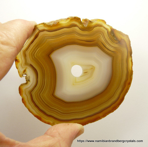 Polished agate slice with hole