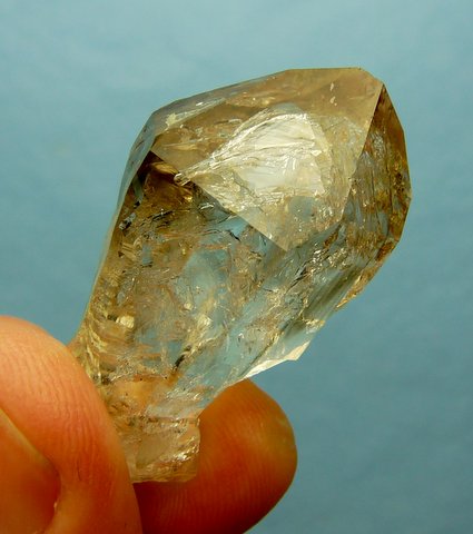 Lovely, gemmy quartz crystal with very light smoky colour and moving bubble