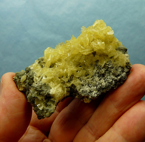 Two-sided specimen of yellow bladed barite crystals on matrix