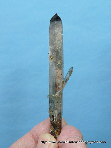 Light smoky quartz crystal group with feldspar