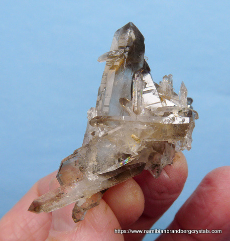 Beautiful, delicate smoky quartz crystals with inclusions